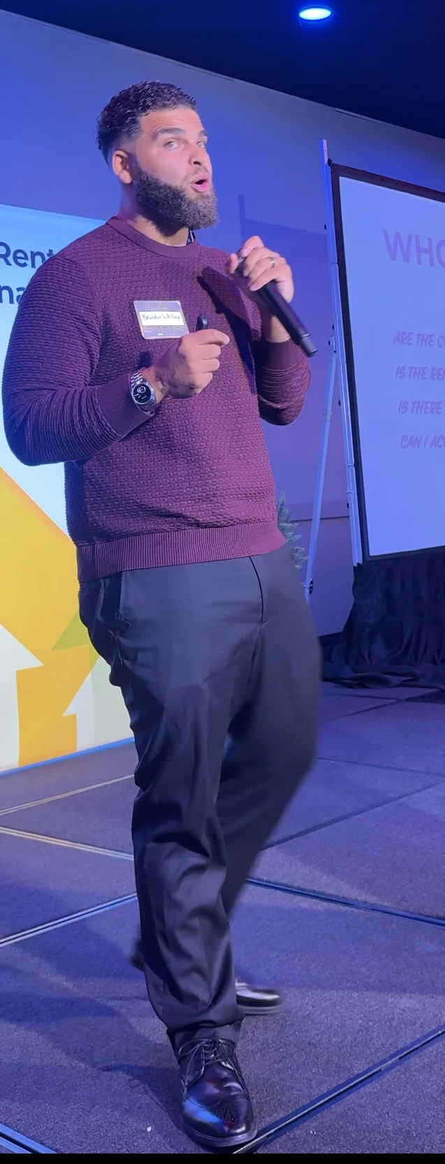 Coach Crim teaching on stage