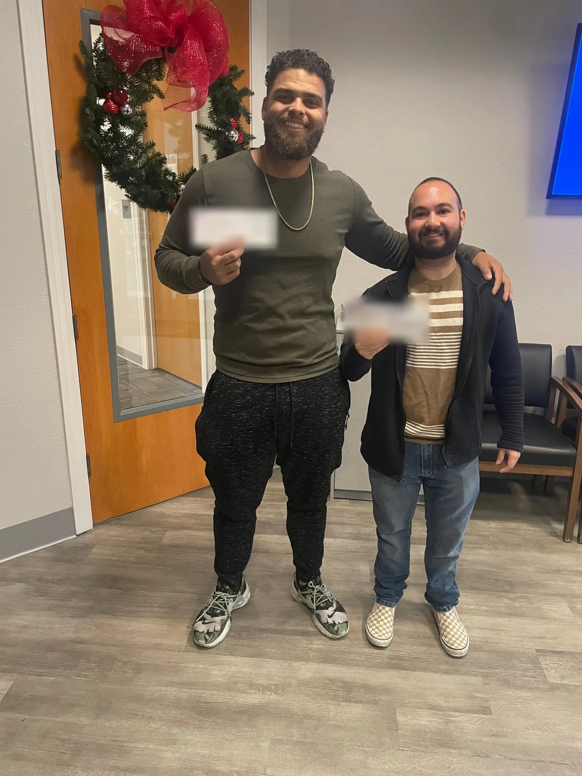 Coach Crim with a student at the student's first closing
